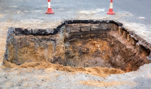 sinkhole in asphalt