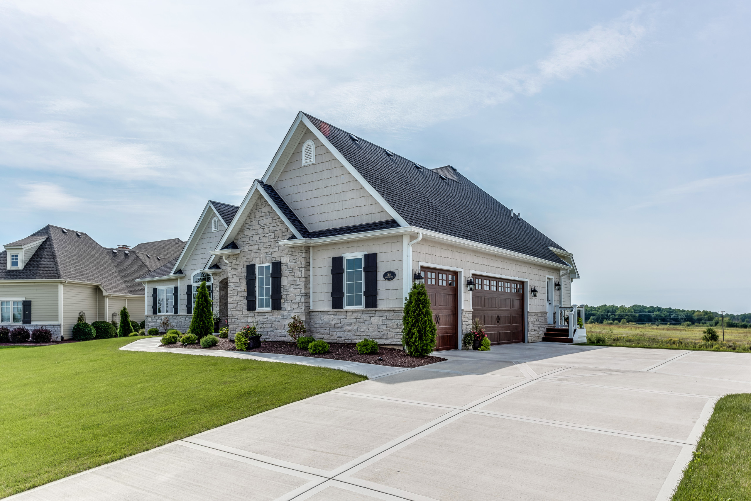 Large gorgeous home with three car garage and wide driveway