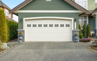 Luxury house with a two-car garage on a sunny day in Vancouver, Canada