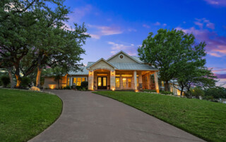 home with a new asphalt driveway
