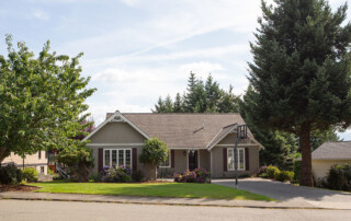 Home with a new asphalt driveway